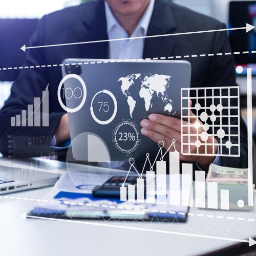 Investor analyzing stock market report and financial dashboard with business intelligence , with key performance indicatorsBusiness team meeting. Photo professional investor working new  project
